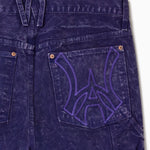 Close up of WOA Canvas Carpenter Shorts in Brick with WA logo on the right back pocket on a white