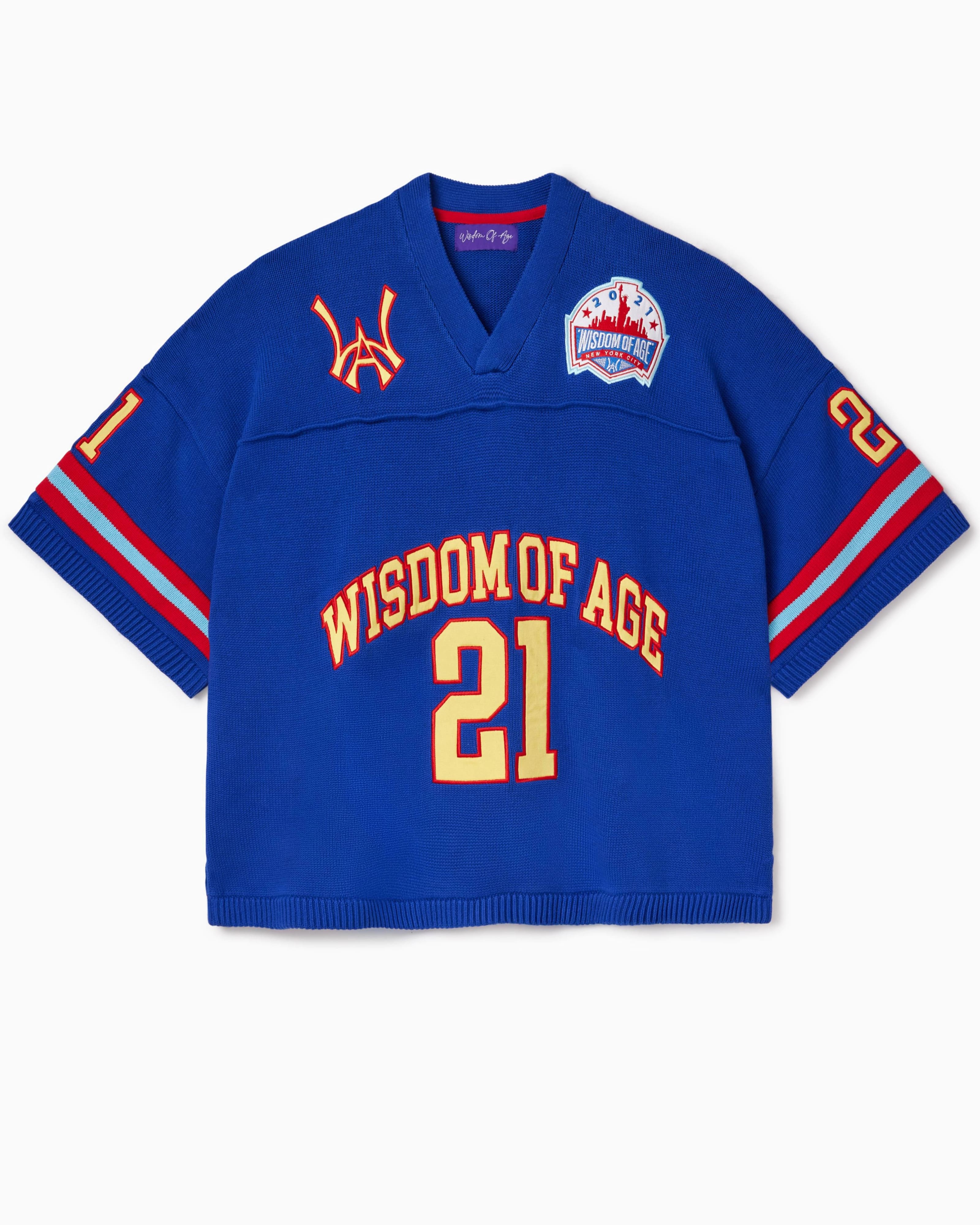 Front view of the Wisdom Of Age Knit Football Jersey in Giant Blue. Wisdom of age written in yellow with a red outline across the midsection with the number 21 in yellow with a red outline.