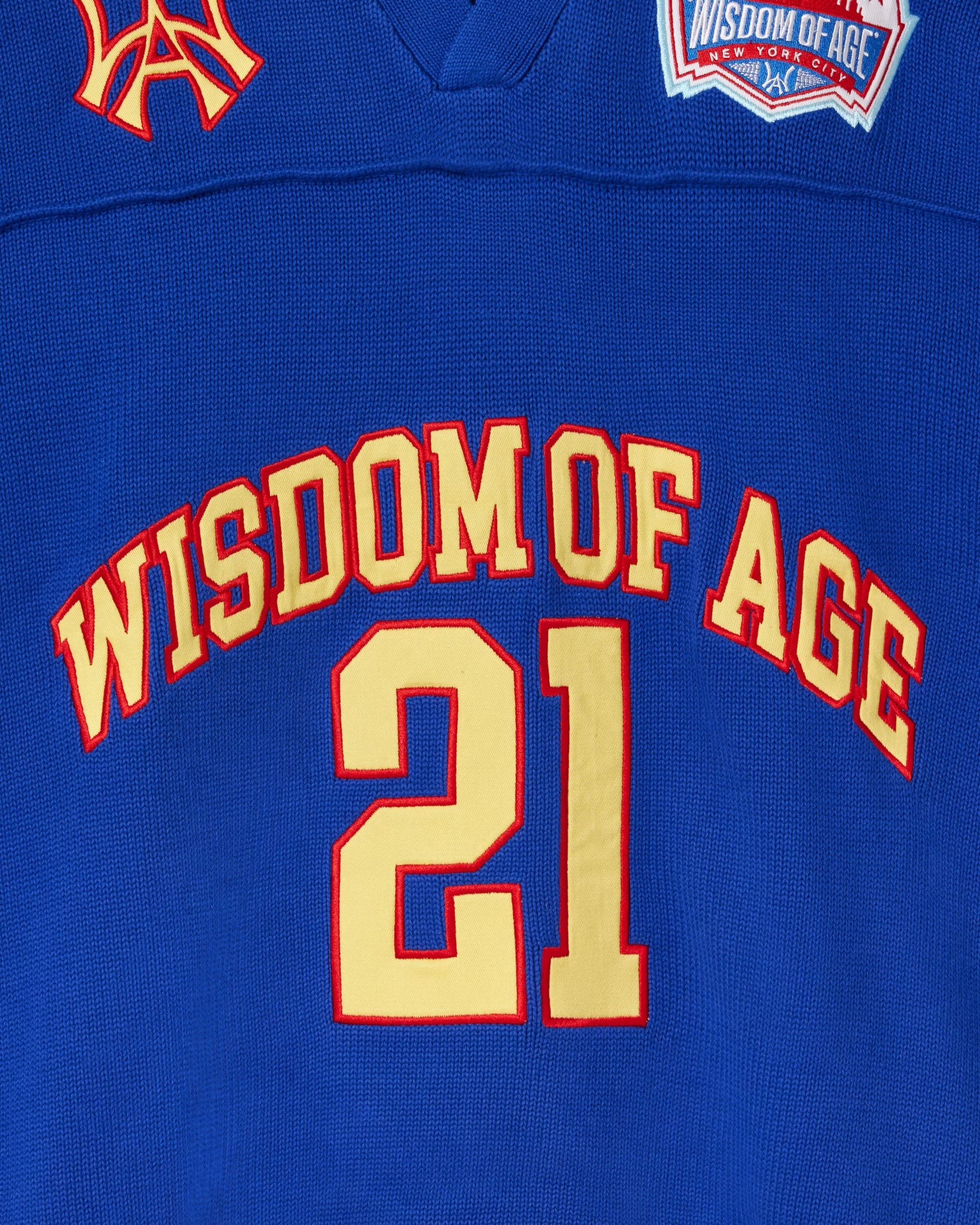 Close up of the front of the Wisdom Of Age Knit Football Jersey in Giant Blue