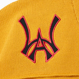 Wisdom Of Age Knit Football Jersey in Mustard - WOA Logo close up