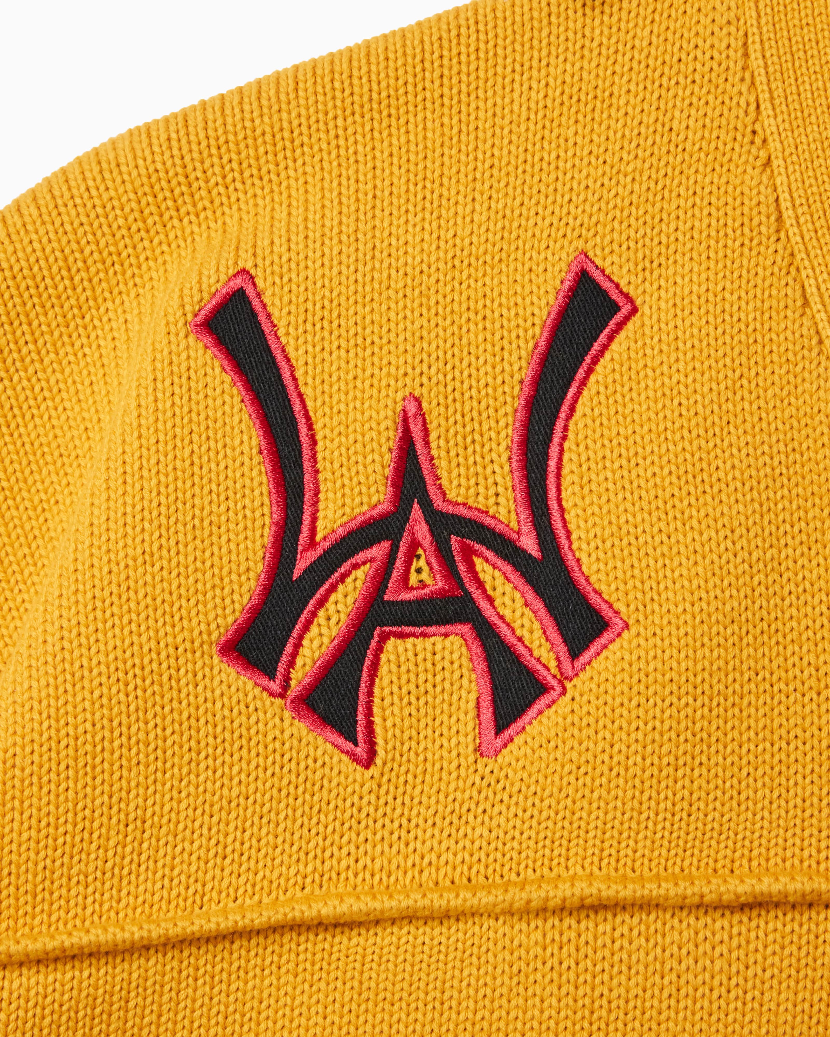Wisdom Of Age Knit Football Jersey in Mustard - WOA Logo close up