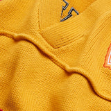 Wisdom Of Age Knit Football Jersey in Mustard - Front View close up