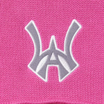 Close-up of the embroidered WA logo on a pink background