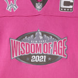 Pink knitted football jersey with Wisdom Of Age logos.
