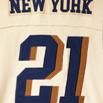 Wisdom Of Age football sports jersey with 'New York' and number '21' on a cream background