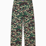 Camouflage pants with a WA logo on a white background