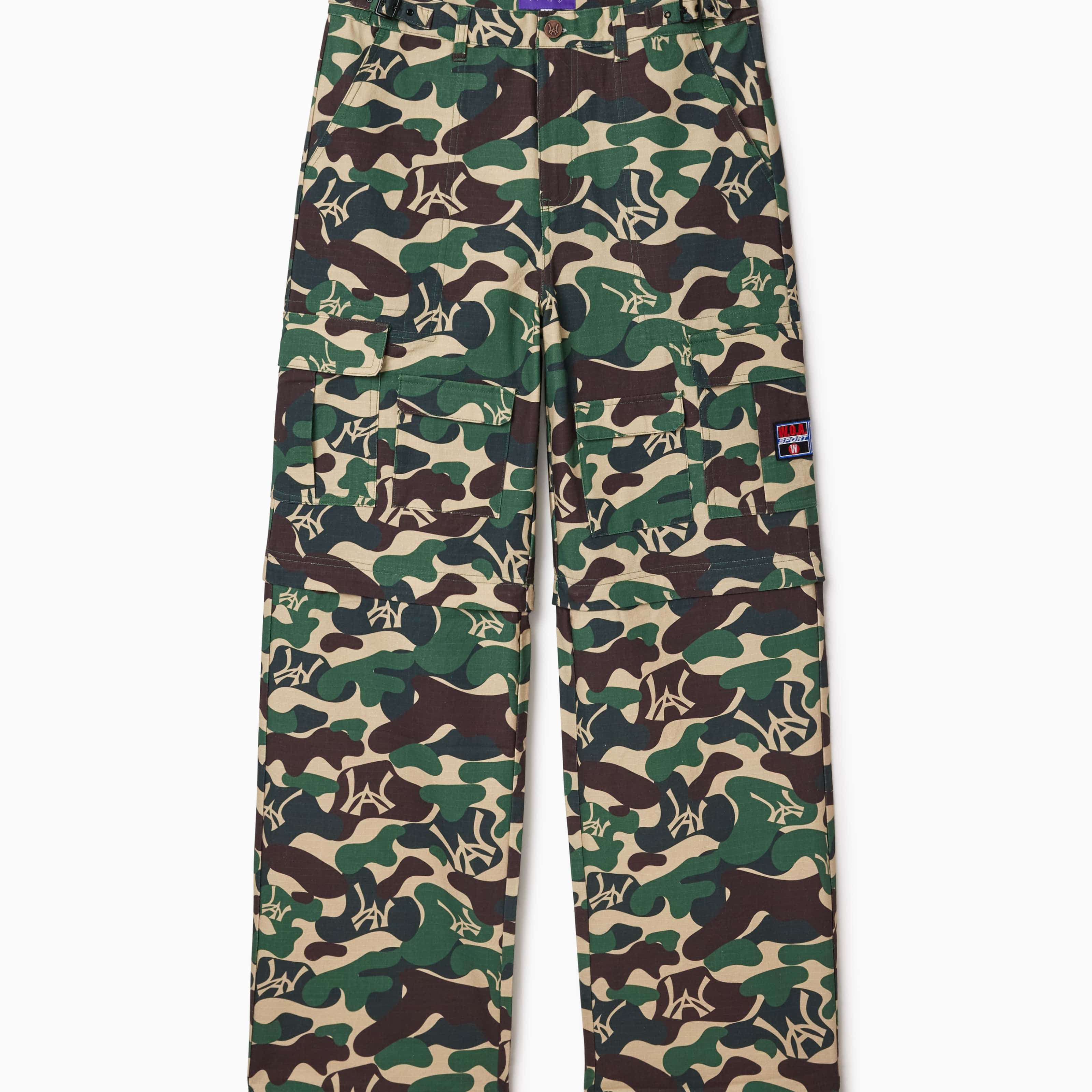 Camouflage pants with a WA logo on a white background