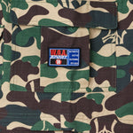 Camouflage fabric with the W.O.A  patch on a pocket
