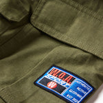 Close-up of the W.O.A patch on a white background