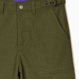 Green cargo pants with a belt and the Wisdom Of Age label on a white background