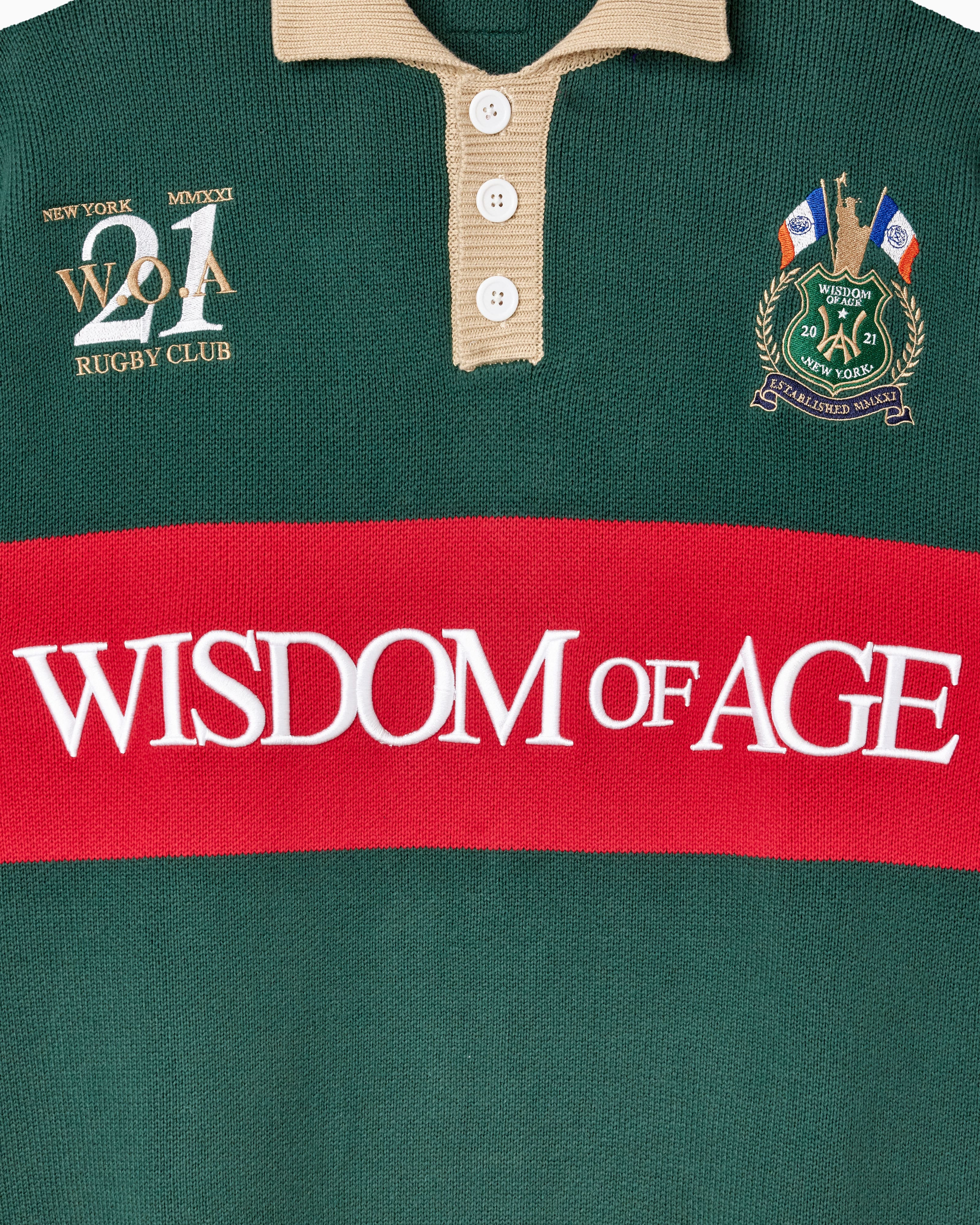 Green and red Wisdom Of Age rugby shirt with 'Wisdom of Age' embroiered text and club logo.