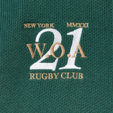 Embroidered WOA logo on a green fabric with text 'New York Rugby Club W.O.A 21'.