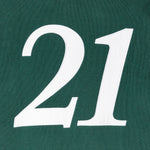 White number '21' on a green background