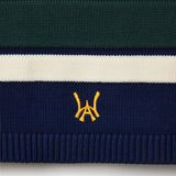 Close Up Of The Wisdom Of Age Knit Hockey Jersey Navy Bottom Front View.
