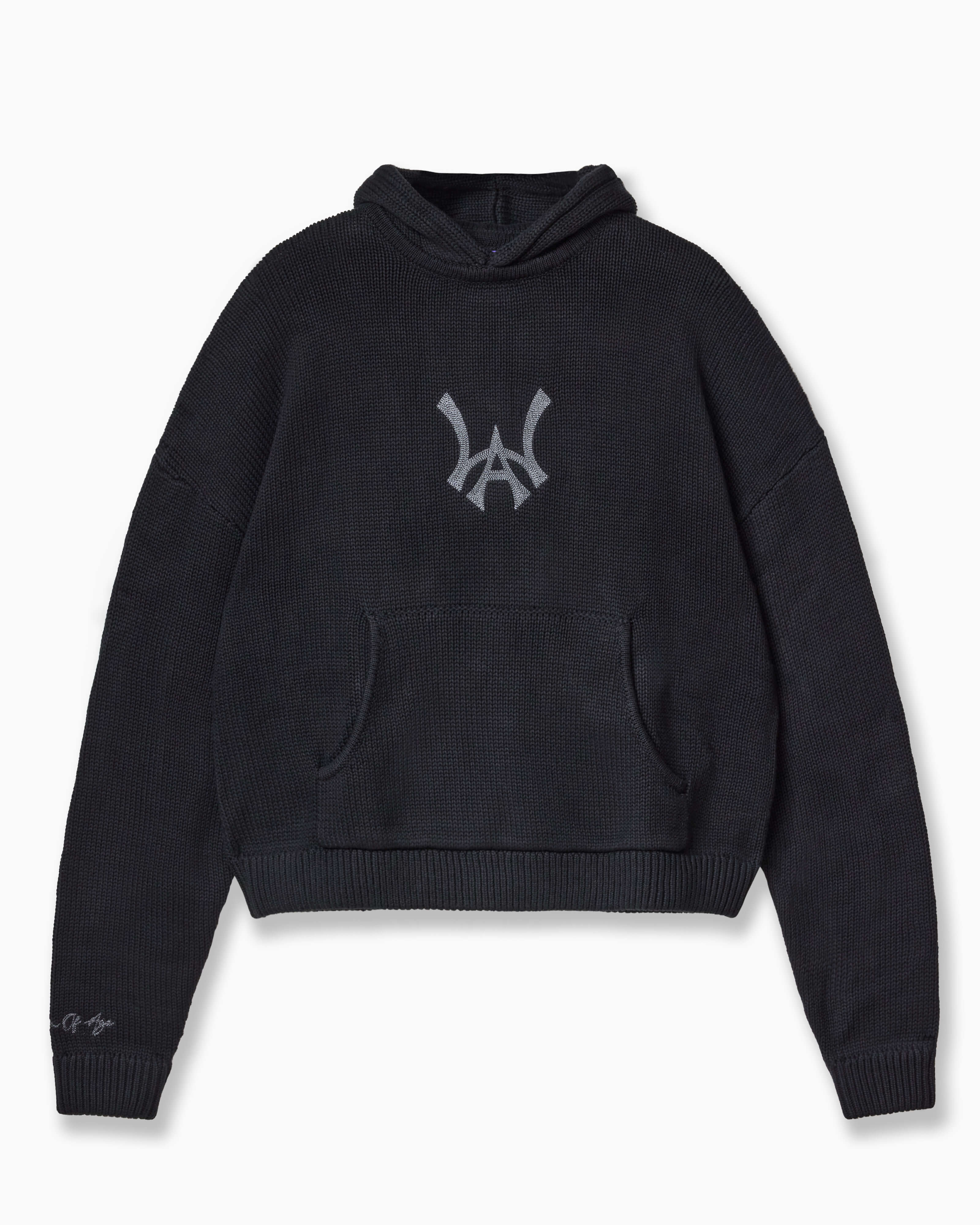 Wisdom of Age Knit Hoodie in Black. Waffle knit texture with the WA symbol in the chest of the hoodie. Kangaroo pocket and embroidered right sleeve with brand name.