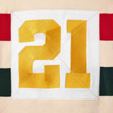 Wisdom of Age Bleecker Rugby Polo in multicolor stripes zoomed back view of embroidered 21 .