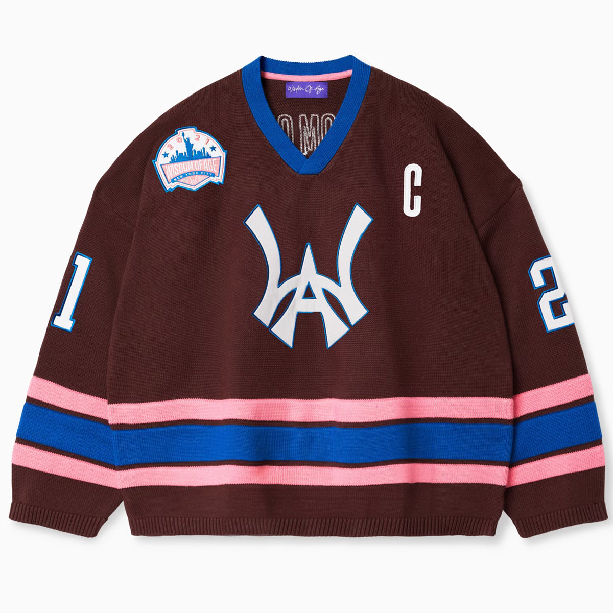 Front view of the Wisdom Of Age Knit Hockey Jersey with the WA logo on the center, the number 21 on both sleeves, a captains patch on the left chest and the wisdom of age patch on the right chest