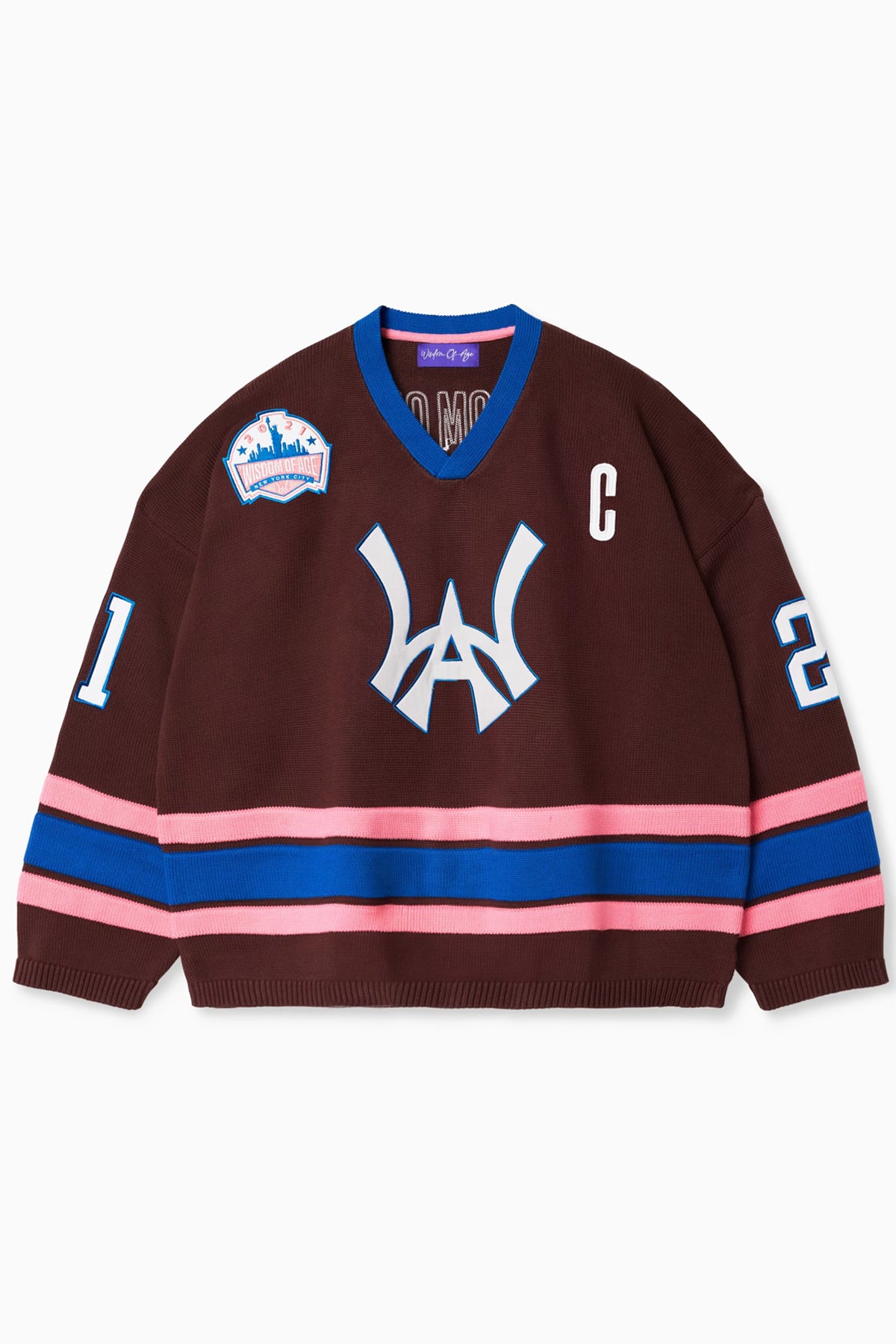 Front view of the Wisdom Of Age Knit Hockey Jersey with the WA logo on the center, the number 21 on both sleeves, a captains patch on the left chest and the wisdom of age patch on the right chest