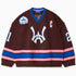 Front view of the Wisdom Of Age Knit Hockey Jersey with the WA logo on the center, the number 21 on both sleeves, a captains patch on the left chest and the wisdom of age patch on the right chest