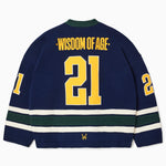 Rear view of the Wisdom Of Age Knit Hockey jersey Purple. Wisdom Of Age on the name plate with the number 21 underneath