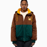 Male Model wearing the Harbor Sailing Jacket  in Mocha / Marine Greent with yellow accents on a white background