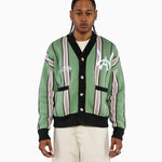 Male model wearing the Wisdom Of Age City Cardigan in Sage Green with striped pattern and WA logo on a white background