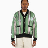Male model wearing the Wisdom Of Age City Cardigan in Sage Green with striped pattern and WA logo on a white background