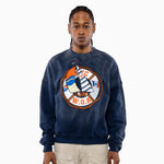 Male Model wearing a navy blue sweatshirt with a logo on a white background