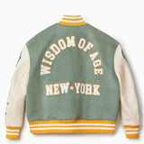Rear view of the wisdom of age mint varisty jacket