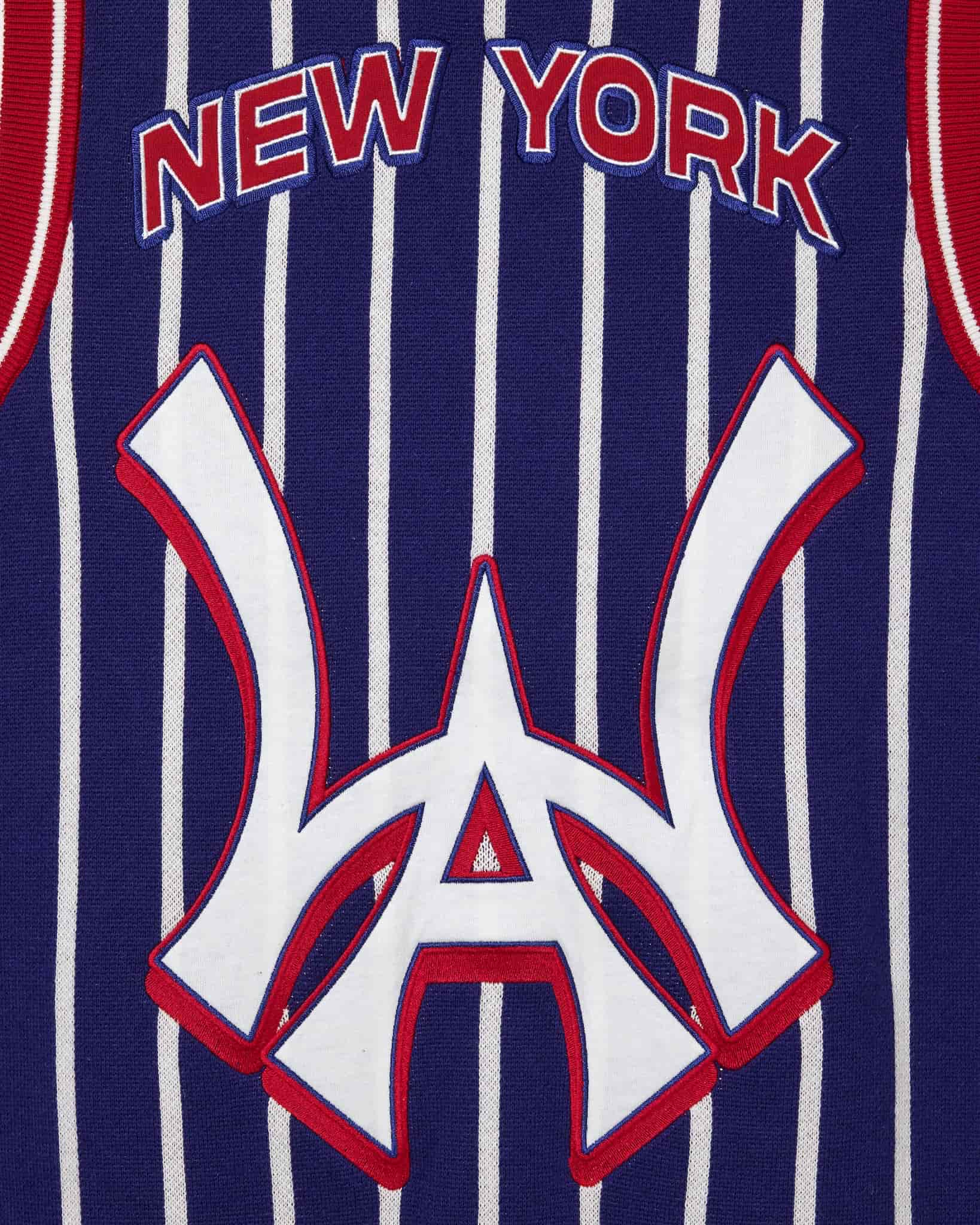 Wisdom Of Age Empire Basketball Jersey Blue Pinstripe black close up view on New York lettering and brand logo